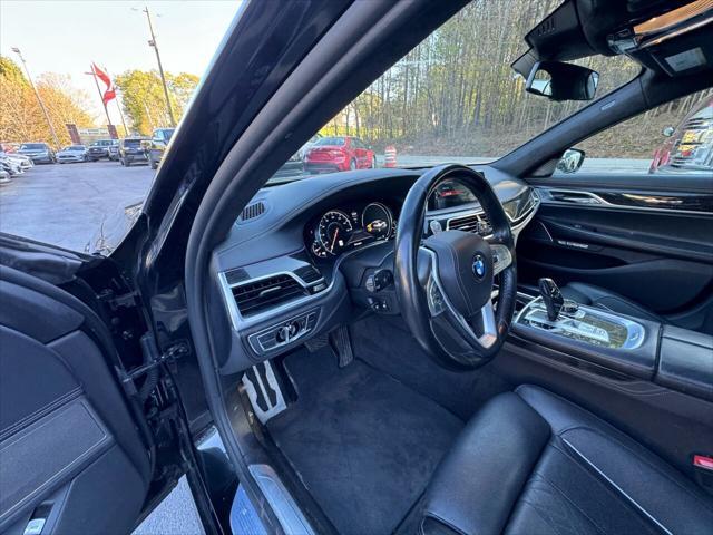used 2016 BMW 750 car, priced at $18,999
