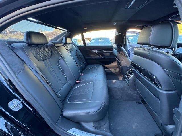 used 2016 BMW 750 car, priced at $18,999