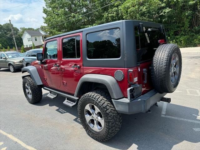 used 2012 Jeep Wrangler Unlimited car, priced at $14,499