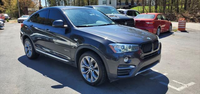 used 2015 BMW X4 car, priced at $13,999