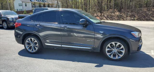 used 2015 BMW X4 car, priced at $13,999