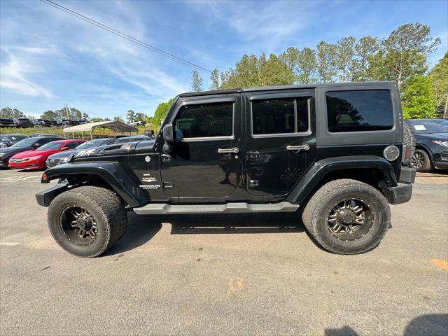 used 2014 Jeep Wrangler Unlimited car, priced at $17,499