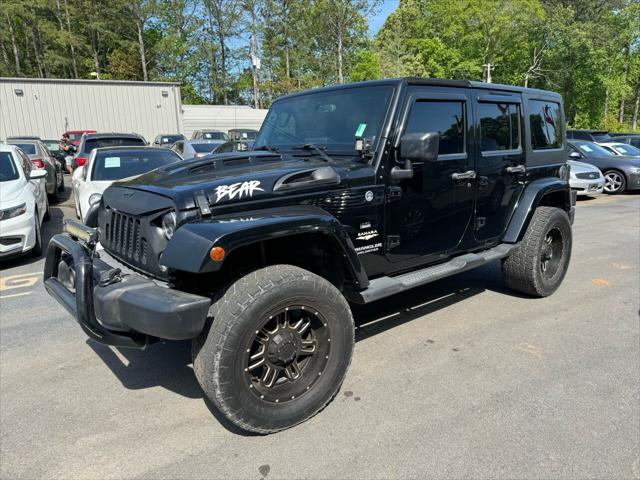 used 2014 Jeep Wrangler Unlimited car, priced at $17,499