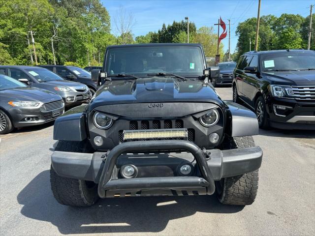 used 2014 Jeep Wrangler Unlimited car, priced at $17,499