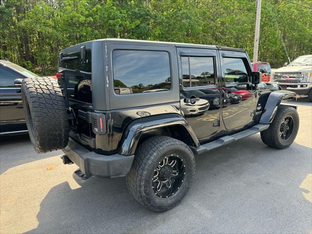 used 2014 Jeep Wrangler Unlimited car, priced at $17,499