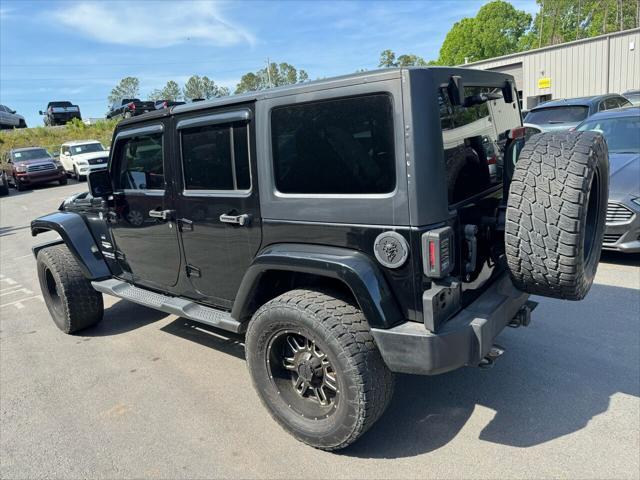 used 2014 Jeep Wrangler Unlimited car, priced at $17,499