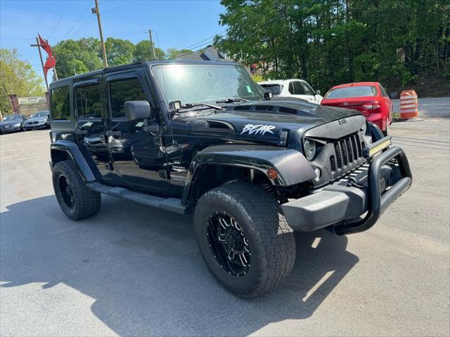 used 2014 Jeep Wrangler Unlimited car, priced at $17,499