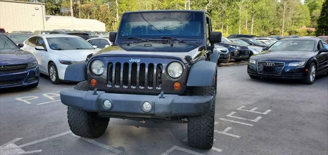 used 2013 Jeep Wrangler Unlimited car, priced at $13,999