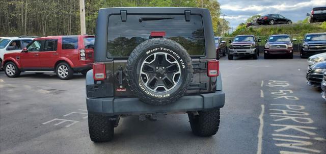 used 2013 Jeep Wrangler Unlimited car, priced at $13,999
