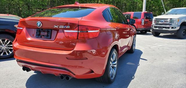 used 2010 BMW X6 M car, priced at $13,999