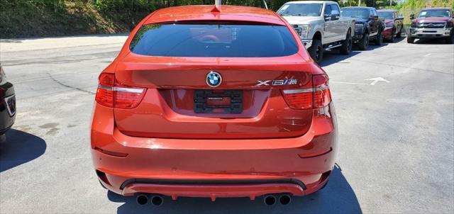 used 2010 BMW X6 M car, priced at $13,999