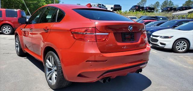 used 2010 BMW X6 M car, priced at $13,999