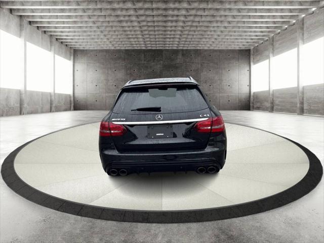 used 2021 Mercedes-Benz AMG C 43 car, priced at $55,000