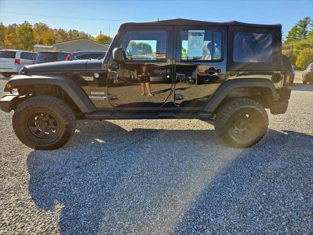 used 2013 Jeep Wrangler Unlimited car, priced at $9,900