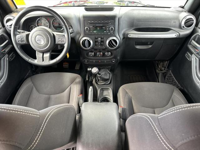 used 2015 Jeep Wrangler Unlimited car, priced at $22,977