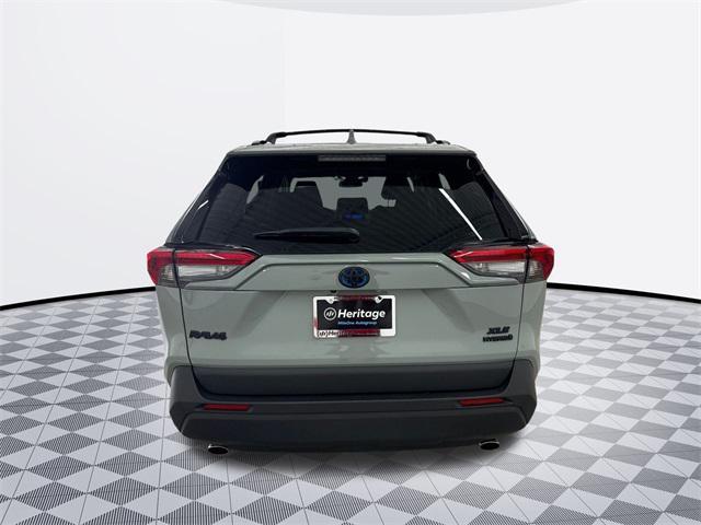 used 2023 Toyota RAV4 Hybrid car, priced at $32,000