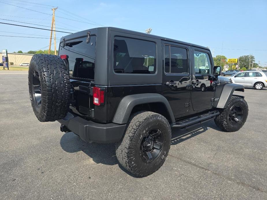 used 2015 Jeep Wrangler Unlimited car, priced at $22,995