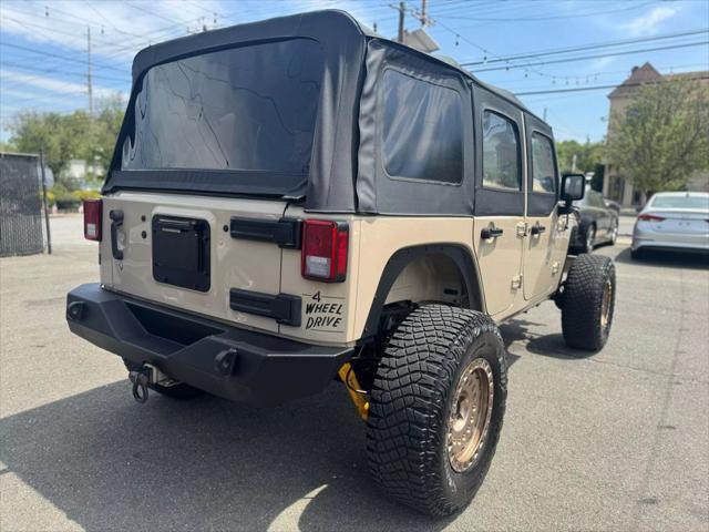 used 2016 Jeep Wrangler Unlimited car, priced at $15,997