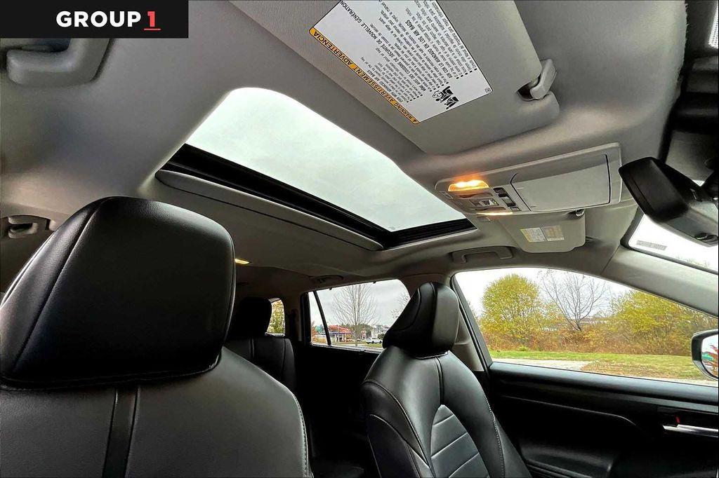 used 2021 Toyota Highlander Hybrid car, priced at $29,991