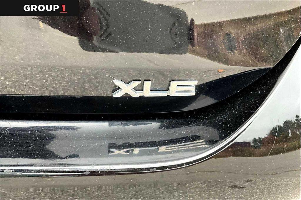 used 2021 Toyota Highlander Hybrid car, priced at $29,991