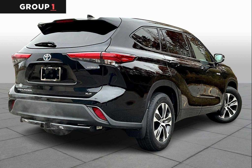 used 2021 Toyota Highlander Hybrid car, priced at $29,991