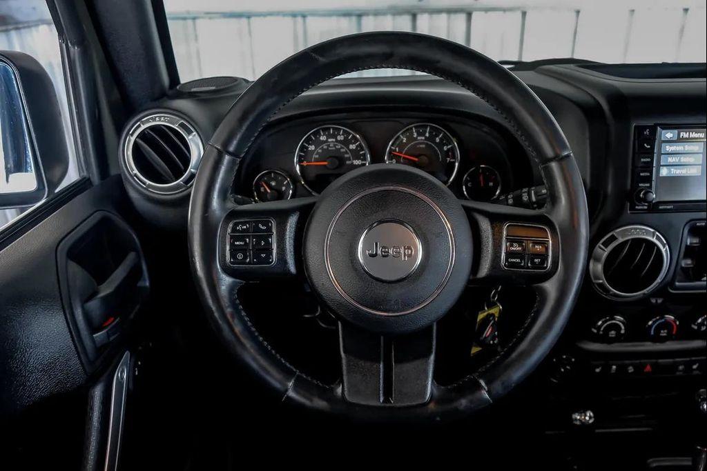 used 2015 Jeep Wrangler Unlimited car, priced at $16,995