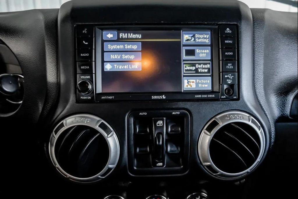 used 2015 Jeep Wrangler Unlimited car, priced at $16,995