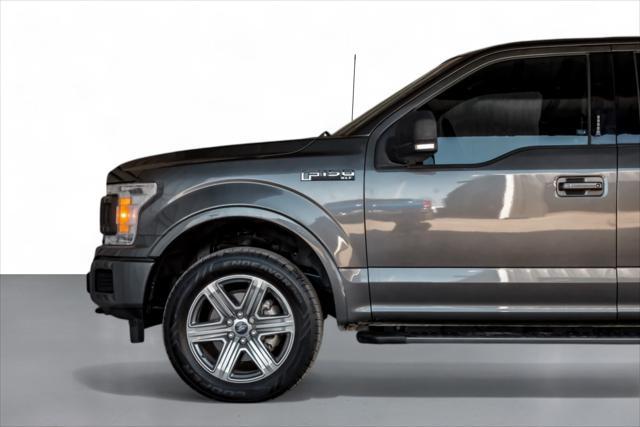 used 2018 Ford F-150 car, priced at $26,995