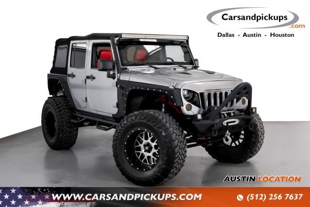 used 2014 Jeep Wrangler Unlimited car, priced at $23,195