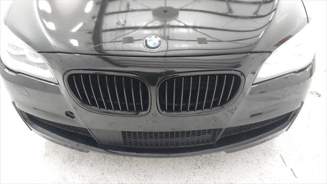 used 2015 BMW 750 car, priced at $17,975