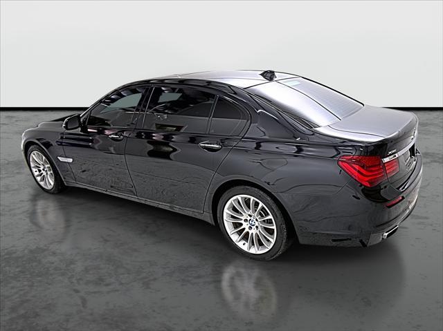 used 2015 BMW 750 car, priced at $17,975