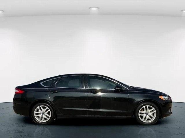 used 2014 Ford Fusion car, priced at $7,000