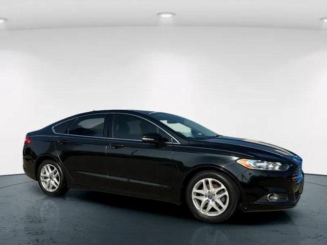 used 2014 Ford Fusion car, priced at $7,000
