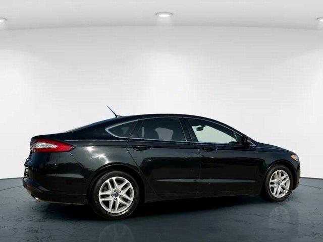 used 2014 Ford Fusion car, priced at $7,000