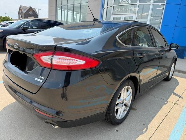 used 2014 Ford Fusion car, priced at $7,000