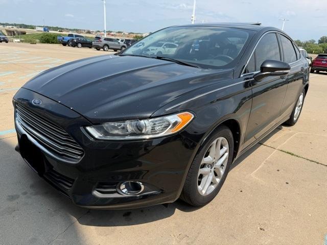 used 2014 Ford Fusion car, priced at $7,000