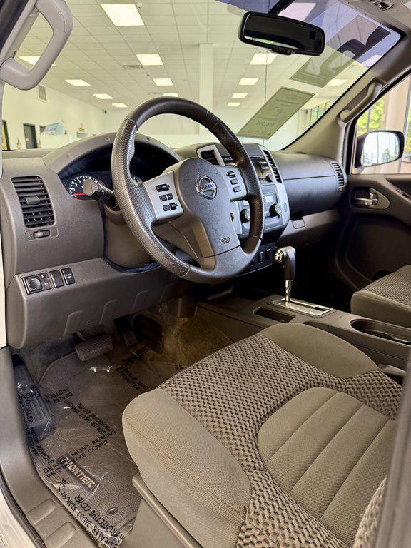 used 2013 Nissan Frontier car, priced at $16,995