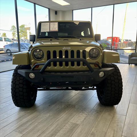 used 2013 Jeep Wrangler Unlimited car, priced at $23,995