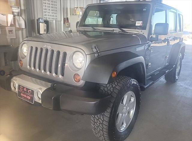 used 2013 Jeep Wrangler Unlimited car, priced at $18,995