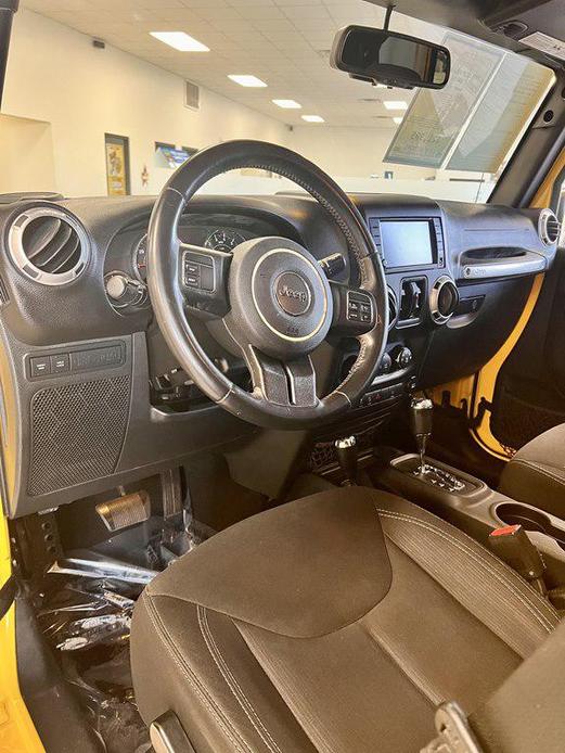 used 2015 Jeep Wrangler Unlimited car, priced at $21,995