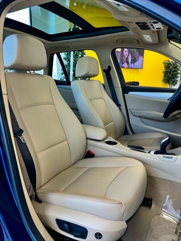 used 2013 BMW X1 car, priced at $14,995
