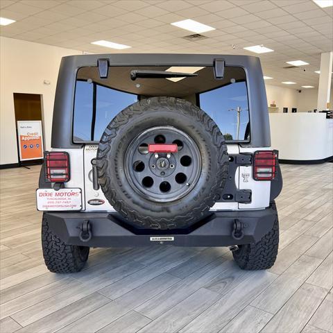 used 2012 Jeep Wrangler Unlimited car, priced at $15,995