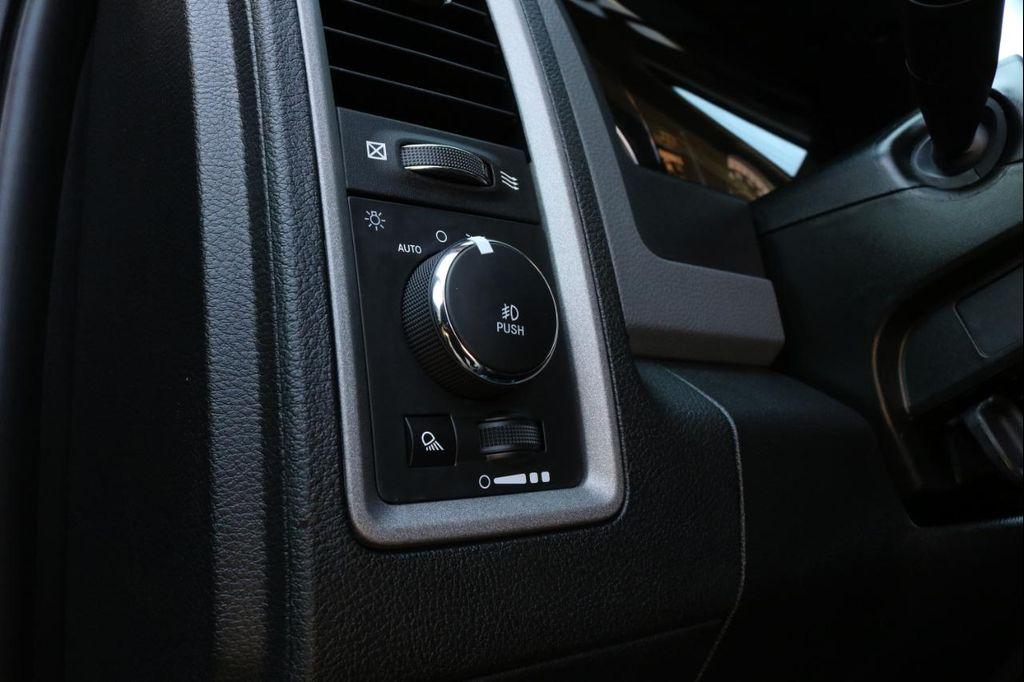 used 2018 Ram 1500 car, priced at $22,000