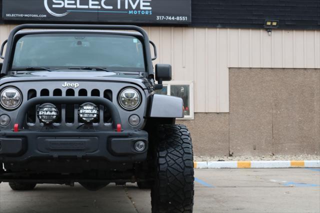 used 2014 Jeep Wrangler Unlimited car, priced at $26,000