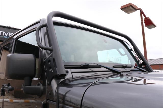 used 2014 Jeep Wrangler Unlimited car, priced at $26,000