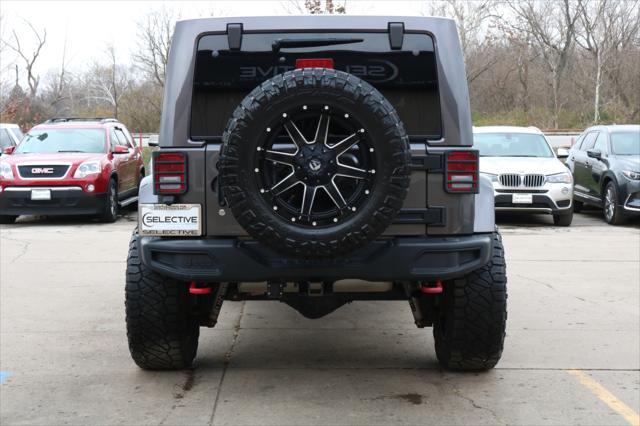 used 2014 Jeep Wrangler Unlimited car, priced at $26,000