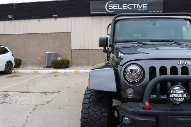 used 2014 Jeep Wrangler Unlimited car, priced at $26,000