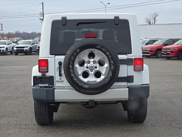 used 2014 Jeep Wrangler Unlimited car, priced at $16,487