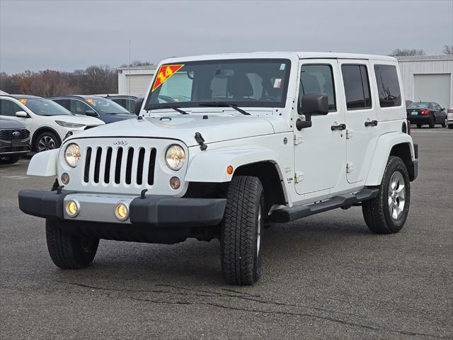 used 2014 Jeep Wrangler Unlimited car, priced at $16,487