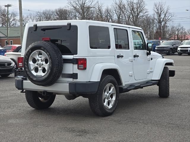 used 2014 Jeep Wrangler Unlimited car, priced at $16,487